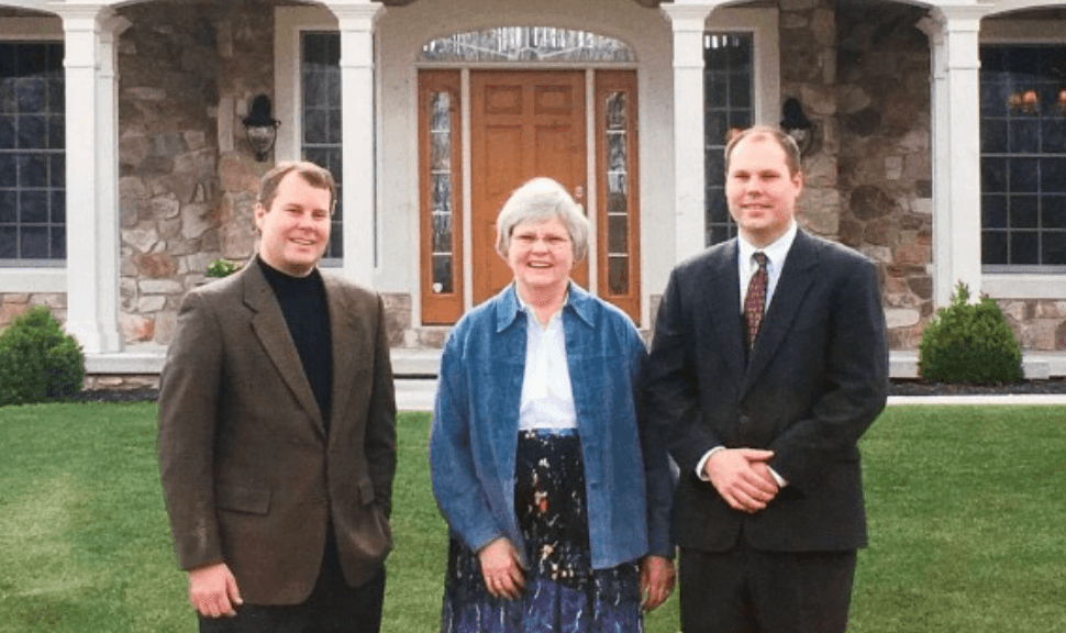 Jim, Virginia, and Doug standing in front of a Classic Communities home